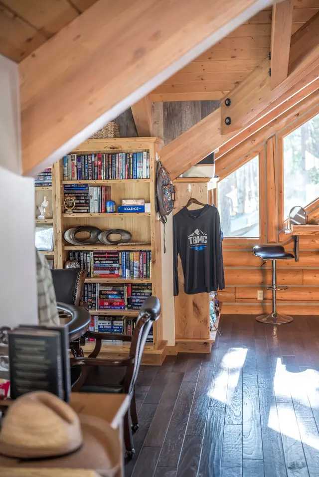 Lodge library and game room with TBMC merchandise